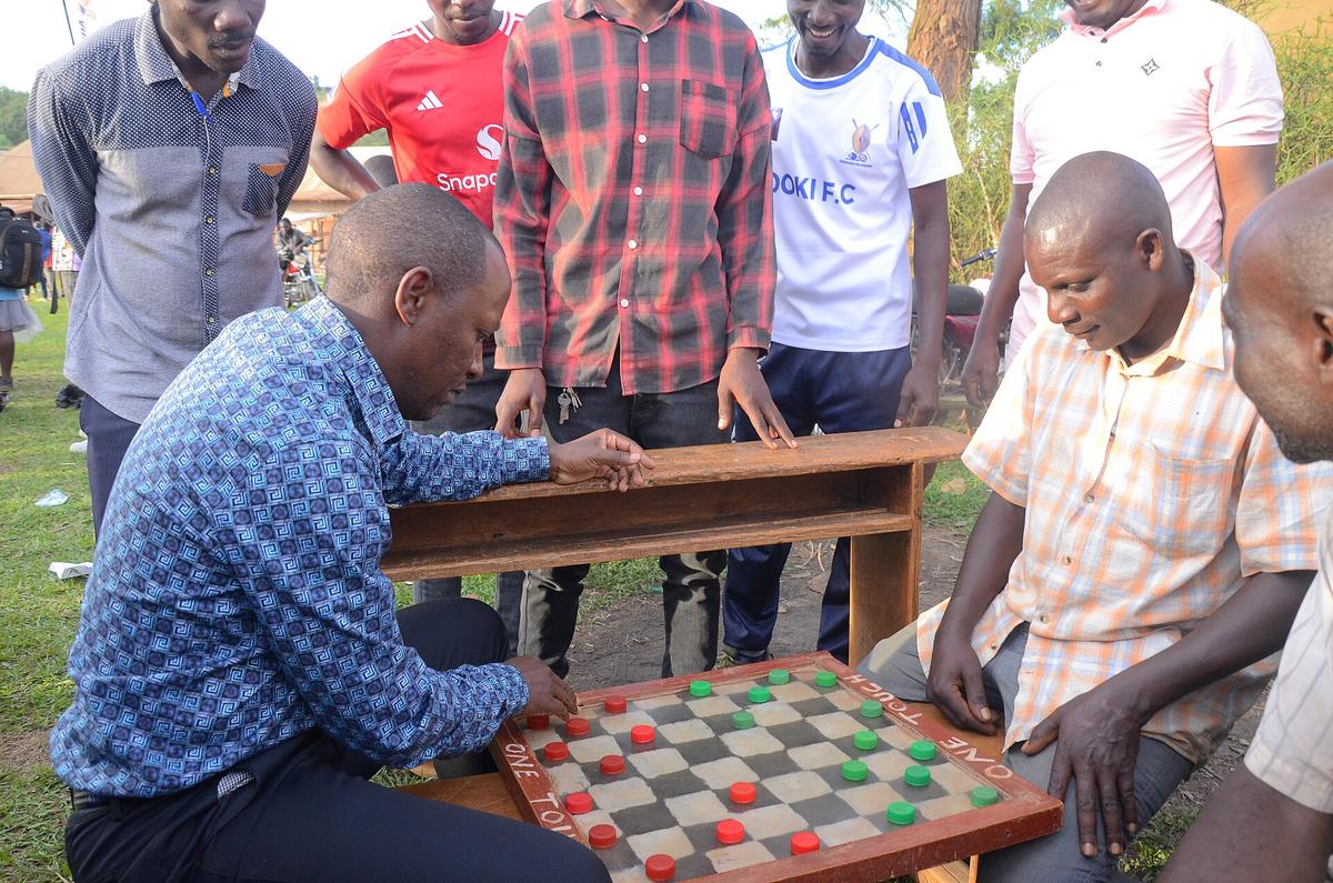 people playing board games